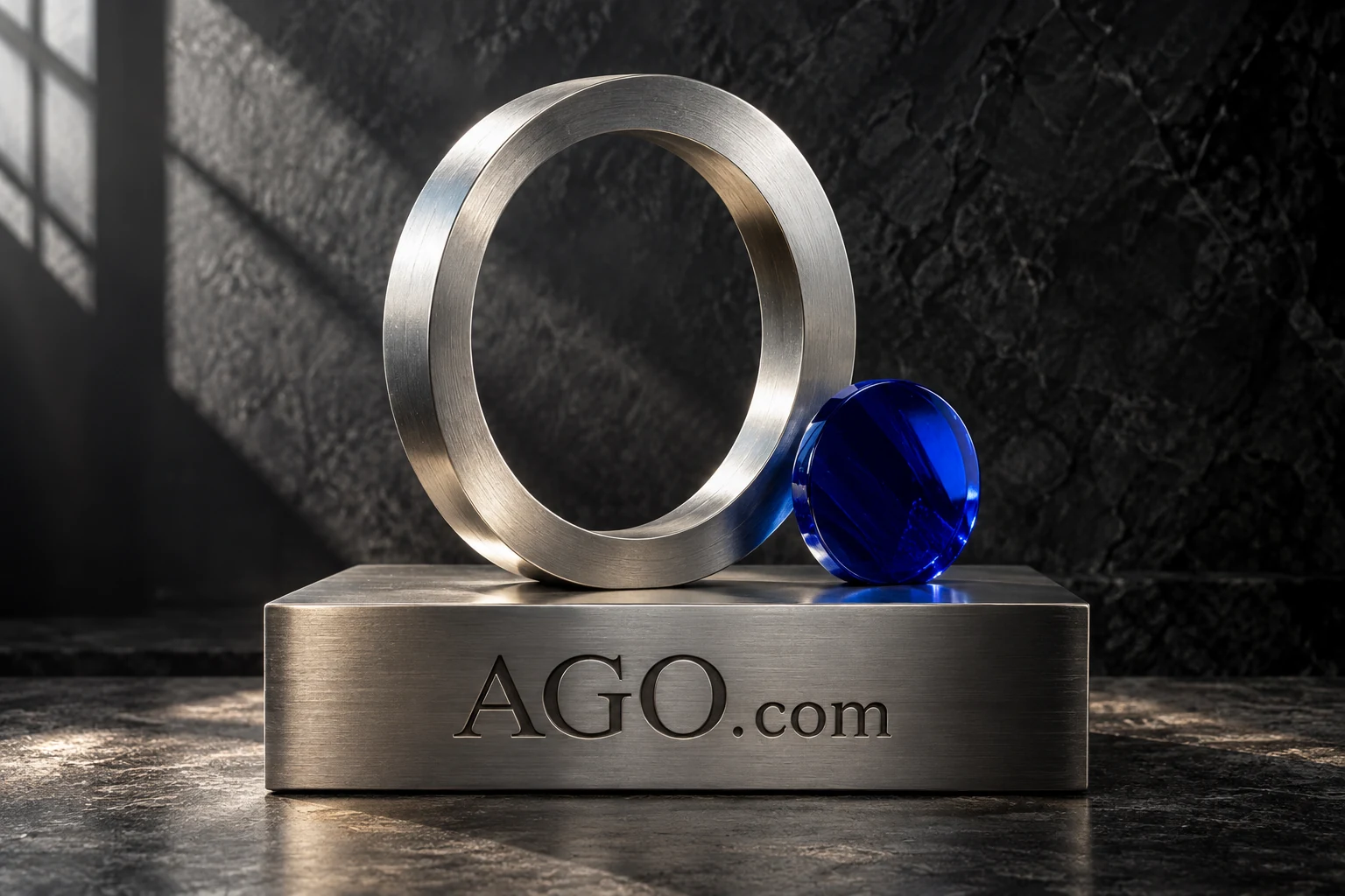 Brushed aluminum sculpture and cobalt glass on an AGO.com plinth