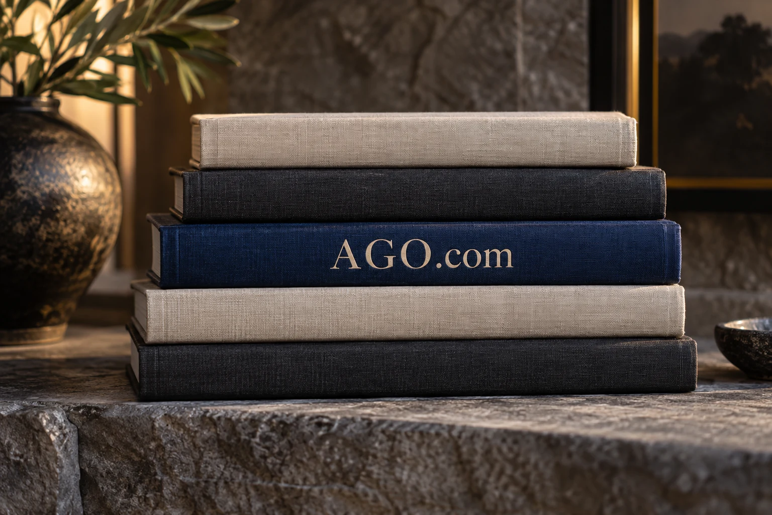 Archival books and design objects bearing AGO.com